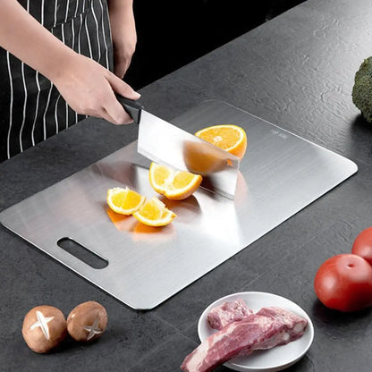 Anti-bacterial, rust-resistant stainless steel cutting board.