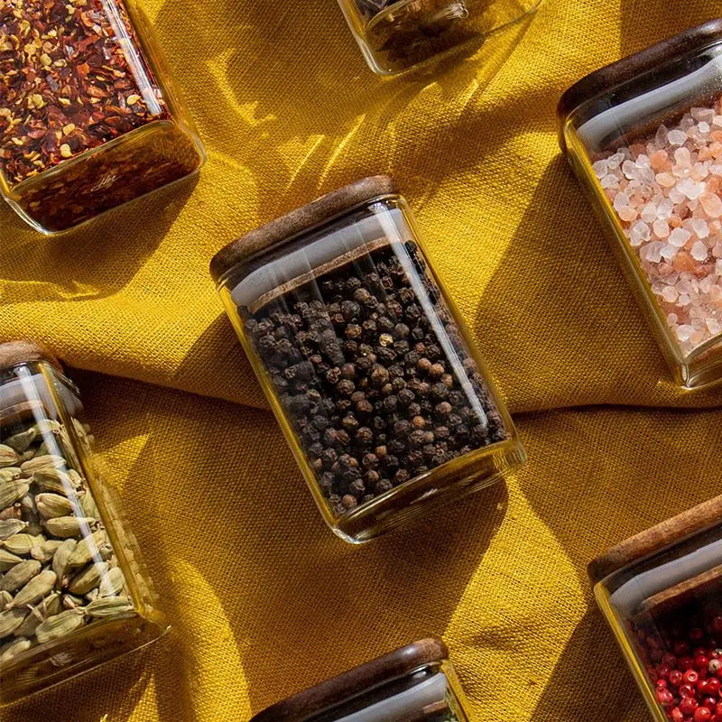 4 pieces of glass with acacia wood lid to store spices.