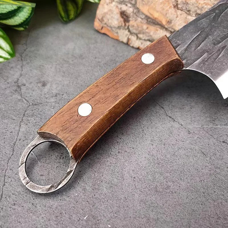 A knife with a wooden handle for bones, meat and other uses